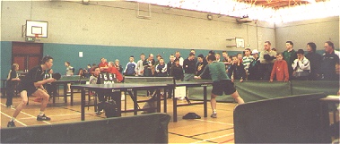 Sean Givernaud against Dane Smith, spectators look on.