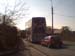 The Bus towing a car