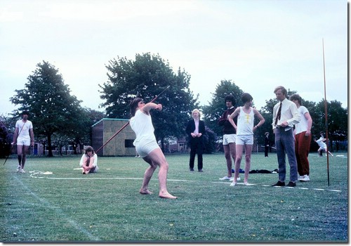 Sports Day - Throwing Javelin-Colin Bell <br>Background -Prem Sharma, Dorian Hawkey, Ben Cheese, Micky Matthews, ano.)