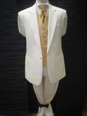 Cream jacket and trousers with plain gold waistcoat