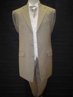 Lightweight tan three-quarter suit with Rialto waistcoat and ivory wing shirt