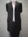 Lightweight black three-quarter suit with white waistcoat and pink cravat (6kb)