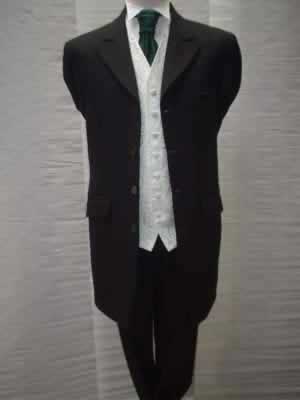 Black herringbone Prince Edward suit with matching trousers, green waistcoat and sage green cravat