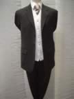 Black lightweight suit with No 7 waistcoat and coffee crepe tie (6kb)