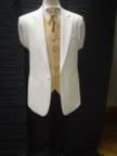 Cream jacket with black trousers and gold waistcoat (6kb)
