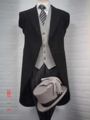 Black herringbone tailcoat with traditional grey stripe trousers and pearl grey waistcoat