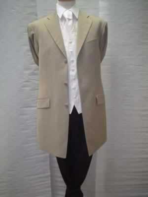 Lightweight tan jacket with black trousers, Rialto waistcoat and cream silk tie