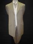 Lightweight tan three-quarter suit with Rialto waistcoat and ivory wing shirt (5kb)