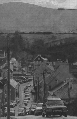 The remains of the late Charlie Bennett makes it's way through Ardara on Tuesday.