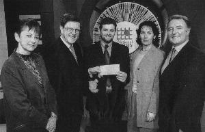 Pictured at the presentation are from left: Ms.Valerie Arron, ticket selling agent, Mr Ray Bates, National Lottery Director, Declan Breslin, Ms.Marie Kennedy Reynolds, Ticket Selling agent, and Mike Murphy, game show host.