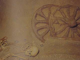 Celtic burial with chariot wheels.