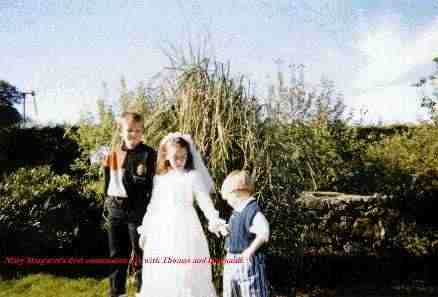 Mary Margaret's first communion with Thomas and Diarmuid