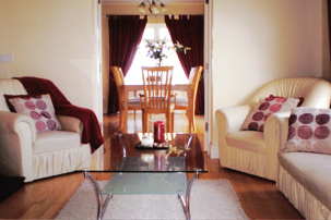 The spacious and relaxing sitting room at Farmstead Lodge B&B (looking through into our dining room where you can enjoy a quiet and relaxed atmosphere whilst we offer you traditional home cooked Irish meals.