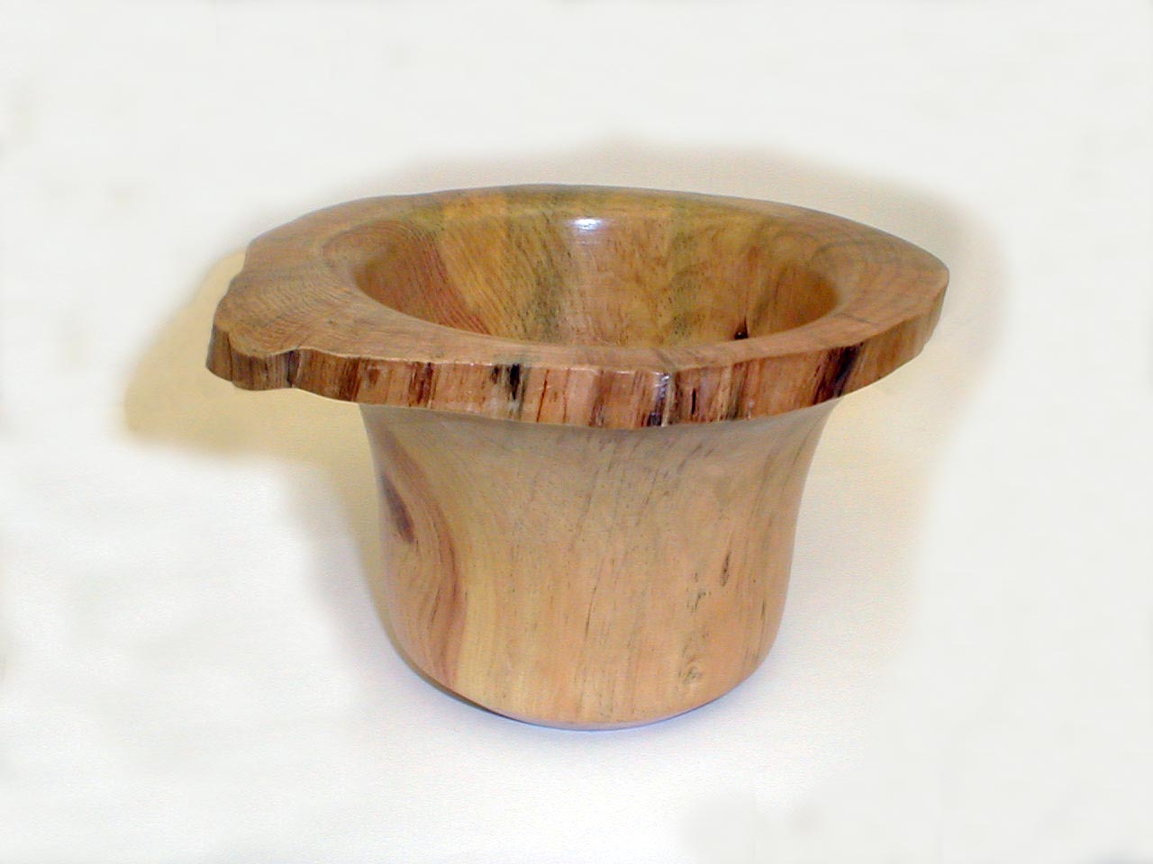 Photograph of a 'waney' edged deep bowl in Monteray Pine