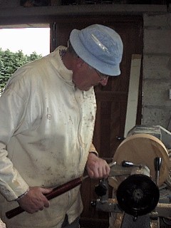 Photograph of Leo O'Donoghue at the lathe.