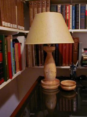 Photograph of a lampstand and matching small bowl in Monteray Pine