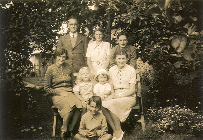Group in garden, Lismore c. 1938