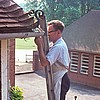 School view from boy's dorm's Gutter maintenance by ladder (who?) , Prem Sharma looking on