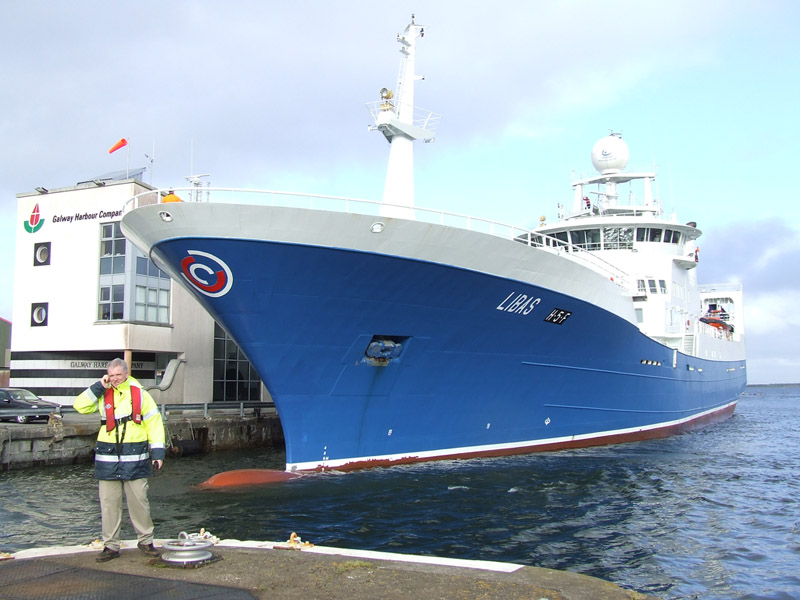 John McGrath oversees the docking of the Norwegian Fishing Research Vessel Libas