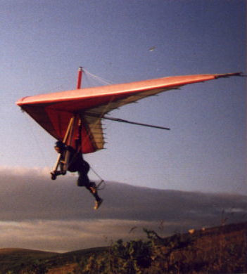 A hang glider taking off