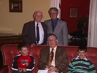 John, Richard, and Peter Finnerty with two young Finnertys from Brideswell area.