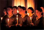GIRLS WITH VIGIL CANDLES