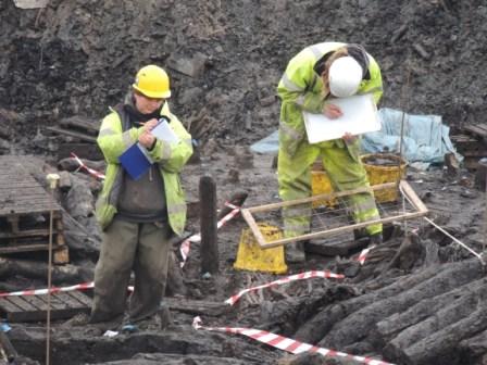 Archaeologists planning a feature on the Crannog.