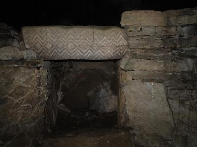 West recess with decorated lintel - Fourknocks Passage Tomb.