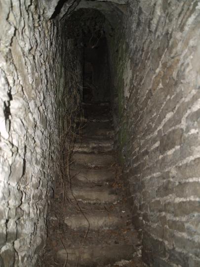 Stairs to first floor from postern door West side of Lanestown Castle