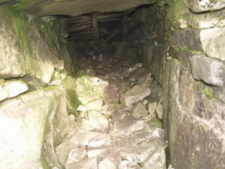 View of surviving passage to burial chamber