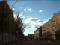 Blue sky and white clouds.  Gardner St. Dublin.  Appartments.