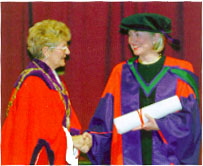 Picture of the First Lady holding the rolled-up scroll