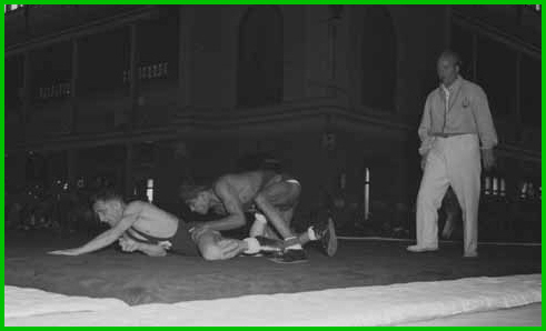 Fred Flannery wrestling Abdul Aziz of Pakistan on 29th November 1956