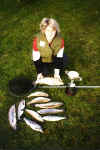 woman+fish.JPG (34778 bytes)