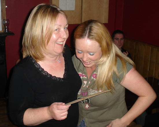 Helen presenting the Check