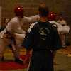 Donal leans over Cathals kick to get him in the head.