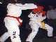 Nigel dodges a two-handed punch from a red-belt ...