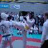 Karl blocks a turning kick from his opponent.