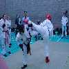 A sneaky turning kick gets in against Joanna.