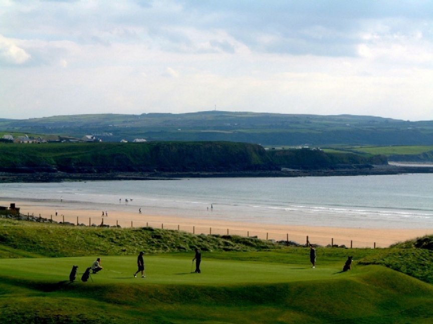 Photo of Lahinch Golf course overlooking the sea and sandy beach